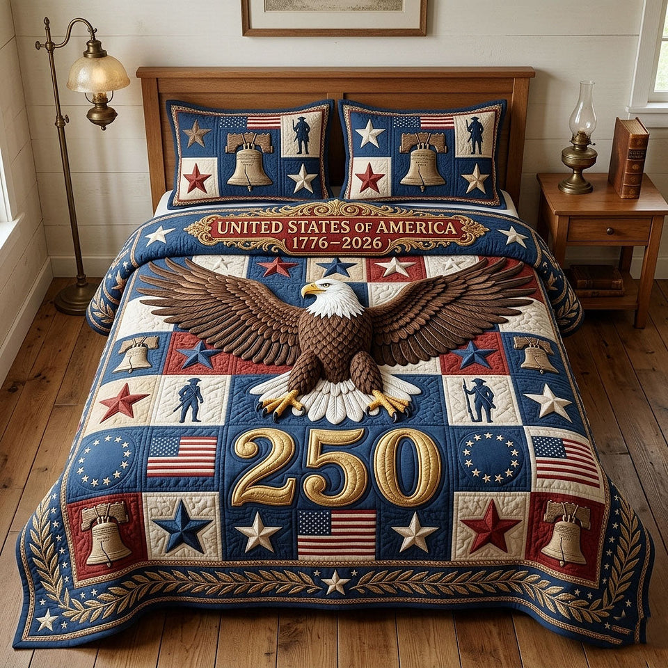 Heritage Patch Gold 250 Brown Eagle quilted bedding set, quilt and two pillow shams on a made bed