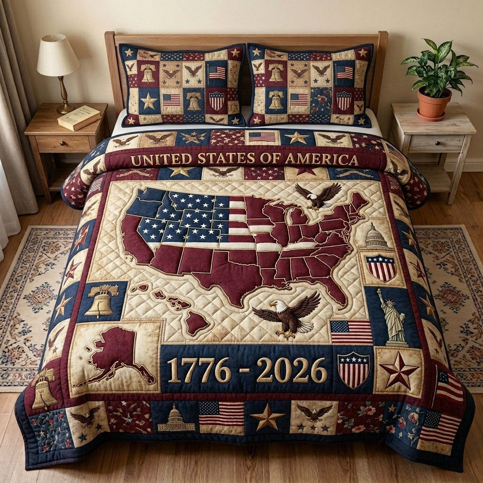 Heritage Patch Map and Eagle Blocks quilted bedding set, quilt and two pillow shams on a made bed