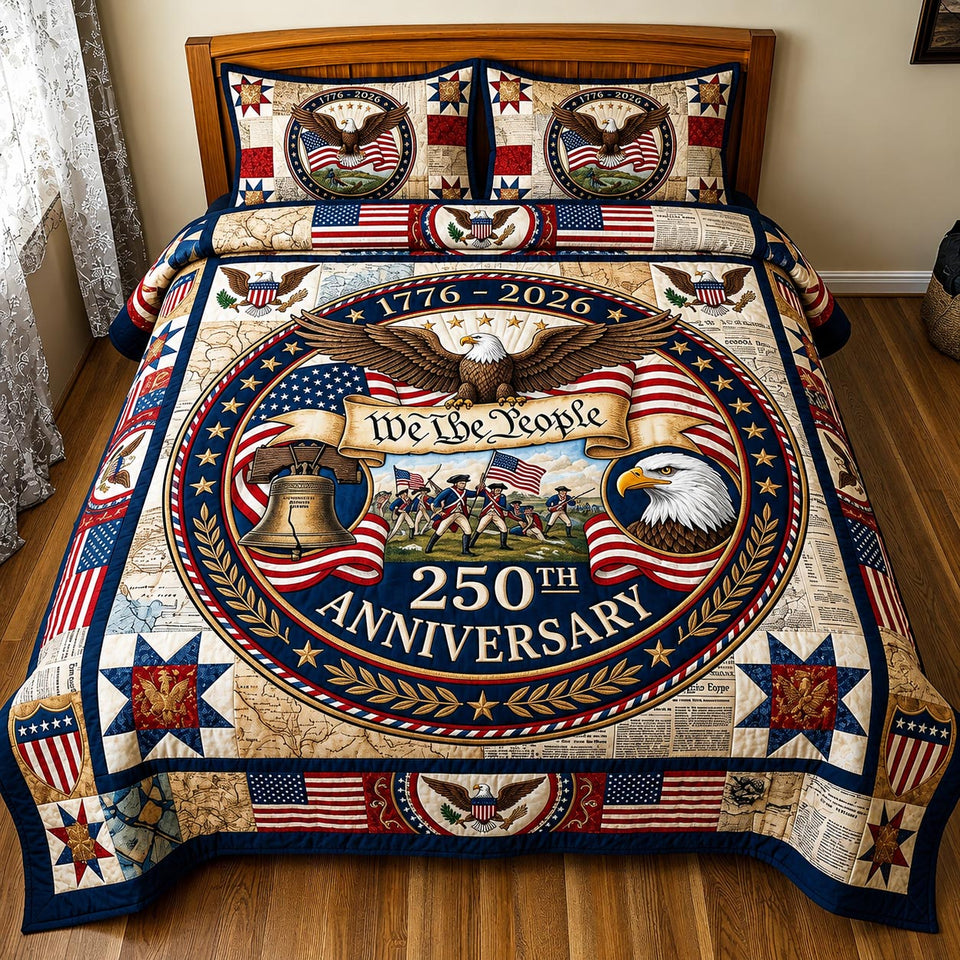Heritage Patch Patriot quilted bedding set, quilt and two pillow shams on a made bed