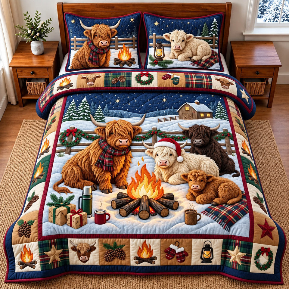 Highland Campfire quilted bedding set, quilt and two pillow shams on a made bed