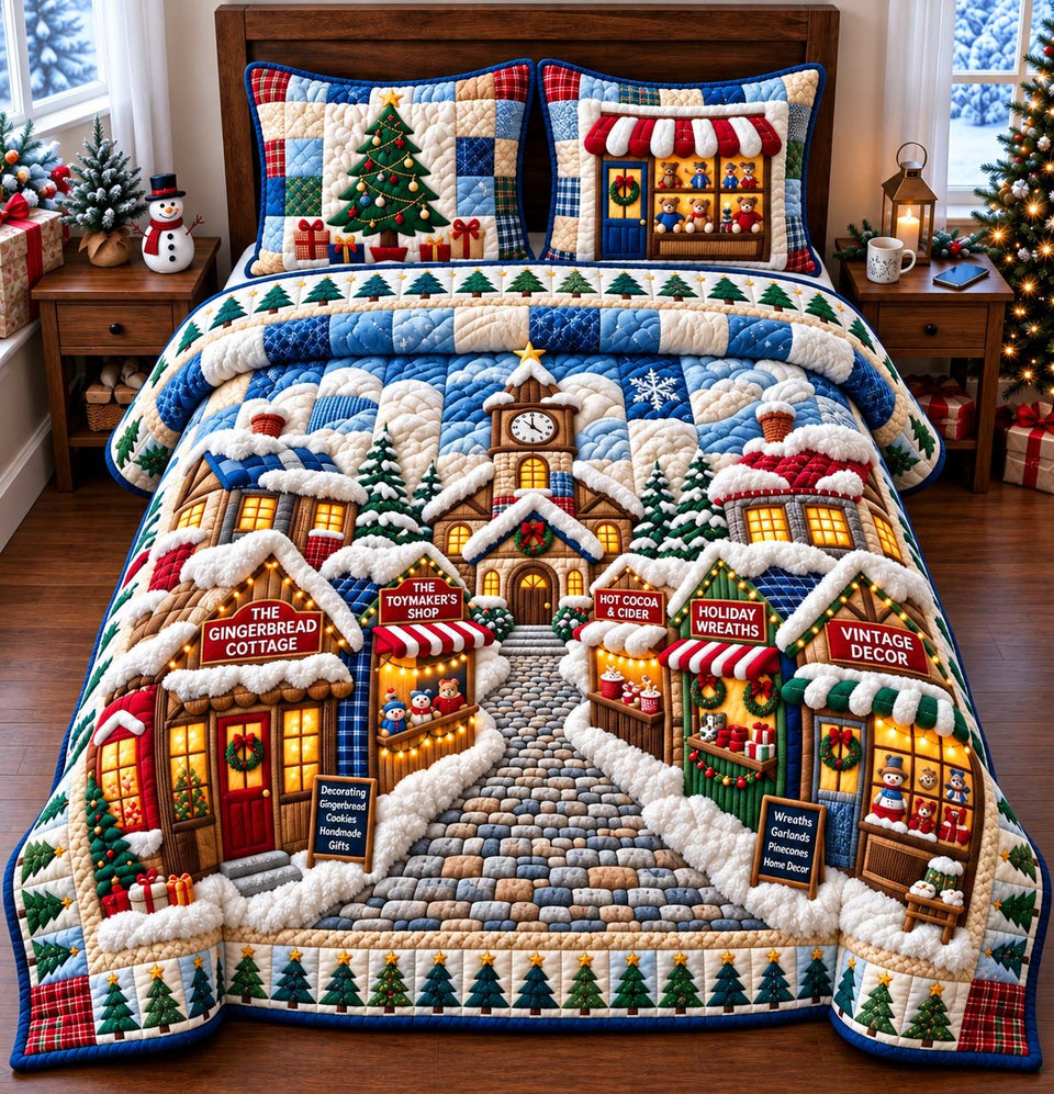 Holiday Market Village quilted bedding set, quilt and two pillow shams on a made bed