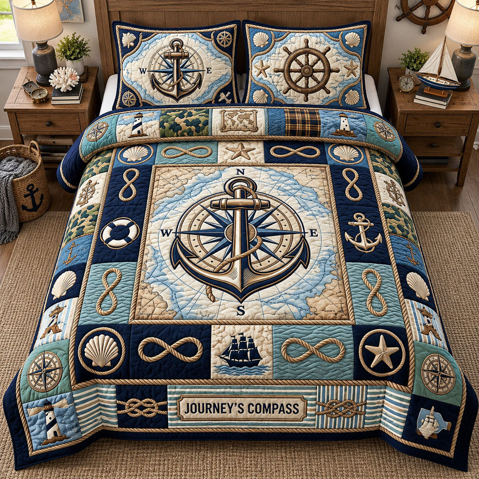 Journey Compass quilted bedding set, quilt and two pillow shams on a made bed