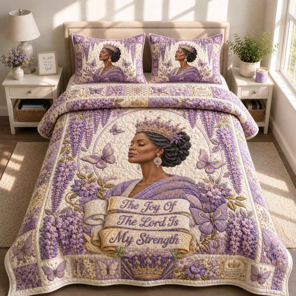 Joy Of the Lord Wisteria quilted bedding set, quilt and two pillow shams on a made bed