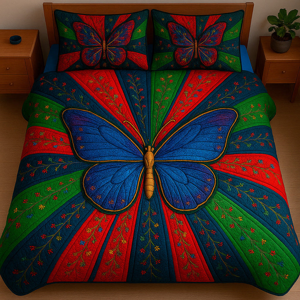 Juneteenth Butterfly Blue Wings on Red Rays quilted bedding set, quilt and two pillow shams on a made bed