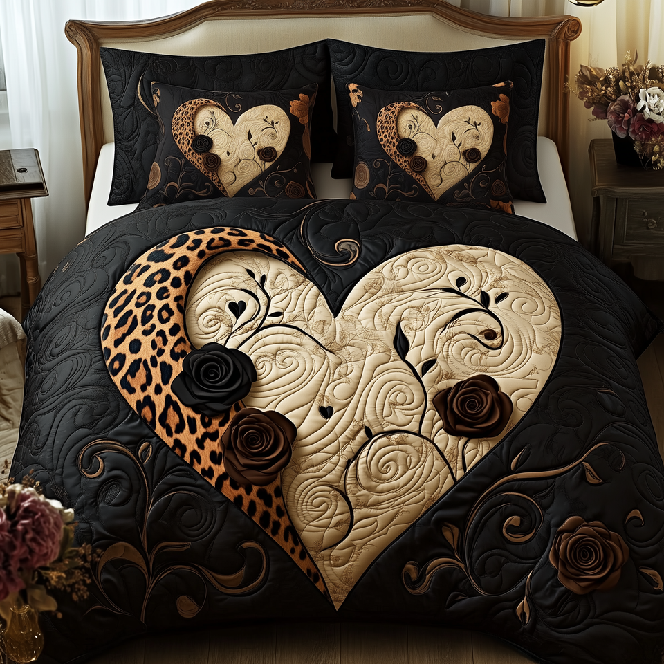 Leopard Heart Split Black And Spotted quilted bedding set, quilt and two pillow shams on a made bed