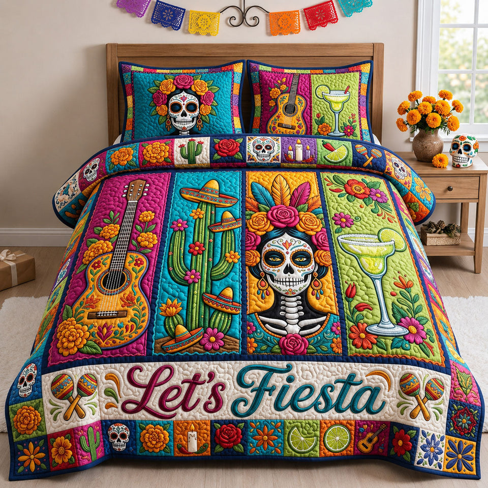 Lets Fiesta quilted bedding set, quilt and two pillow shams on a made bed