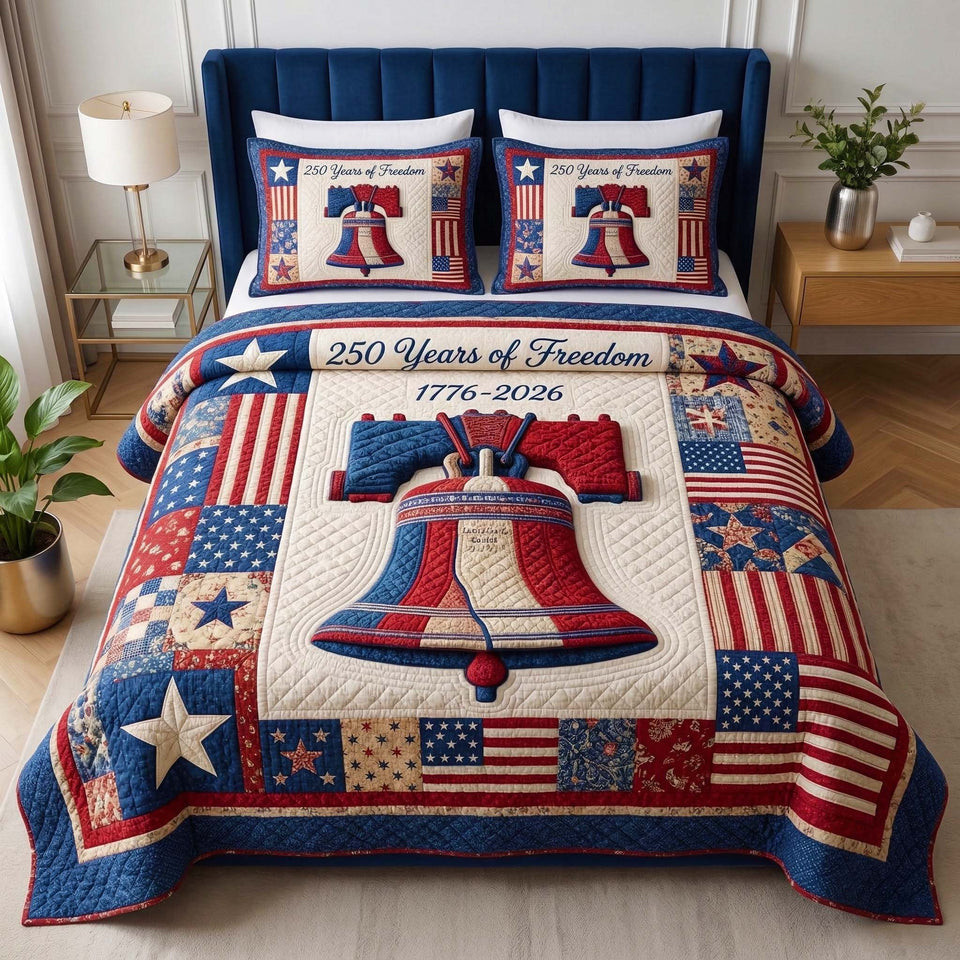 Liberty Bell Flags and Freedom Banner quilted bedding set, quilt and two pillow shams on a made bed