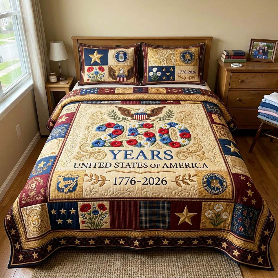 Liberty Eagle Cream Wreath Numerals quilted bedding set, quilt and two pillow shams on a made bed