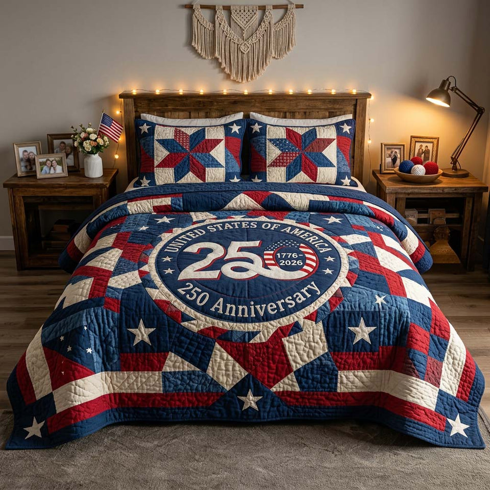 Liberty Emblem quilted bedding set, quilt and two pillow shams on a made bed