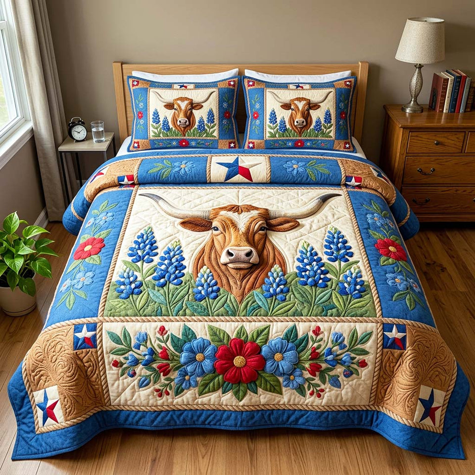 Longhorn Bluebonnet quilted bedding set, quilt and two pillow shams on a made bed