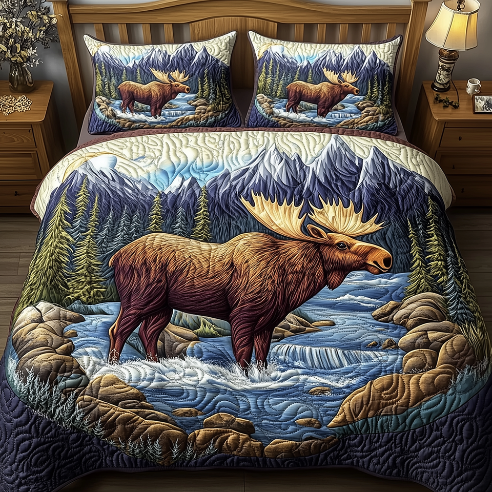 Majestic Moose Blue River Crossing quilted bedding set, quilt and two pillow shams on a made bed