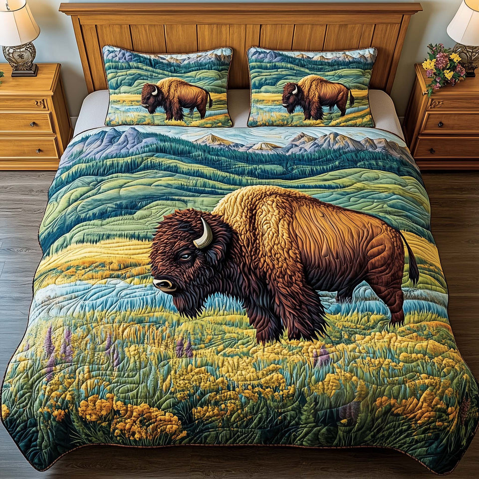 Meadow Bison quilted bedding set, quilt and two pillow shams on a made bed