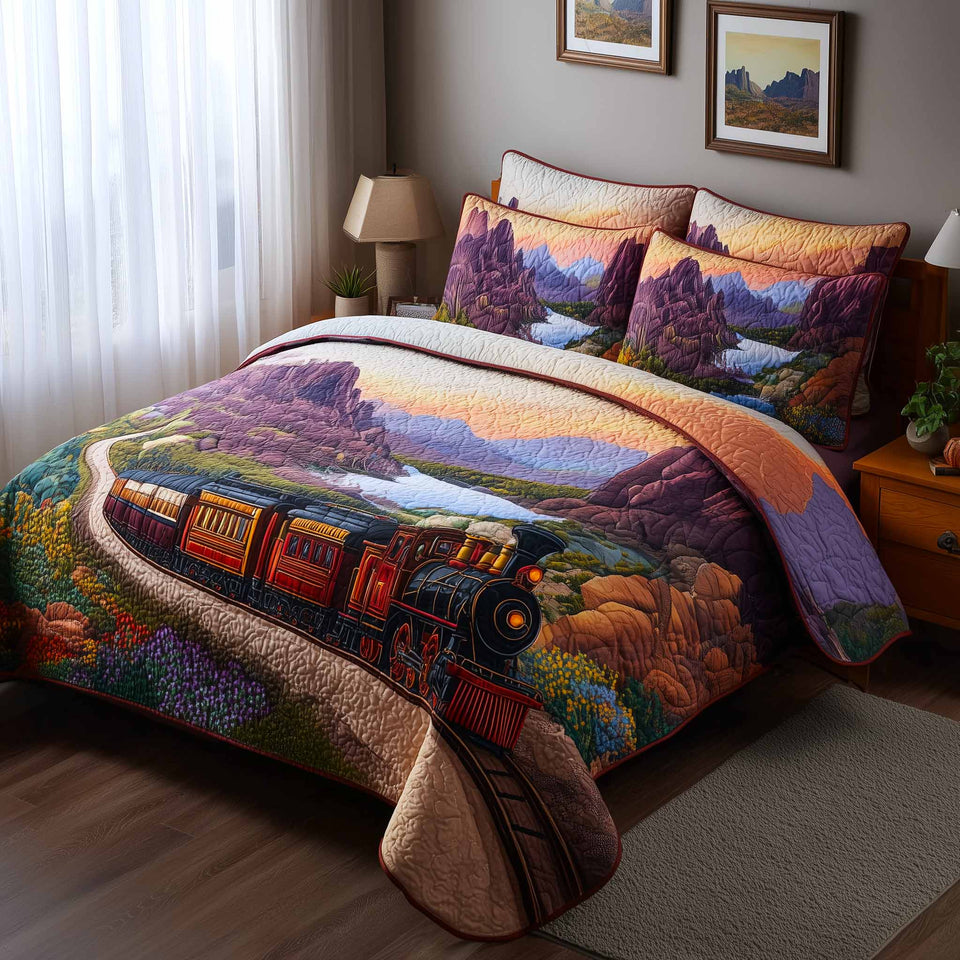 Meadow Train quilted bedding set, quilt and two pillow shams on a made bed
