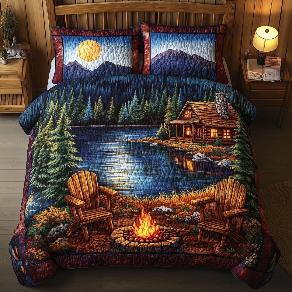 Midnight Harmony Moonrise Pine Camp quilted bedding set, quilt and two pillow shams on a made bed