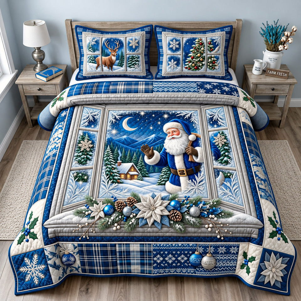 Moonlight Santa quilted bedding set, quilt and two pillow shams on a made bed