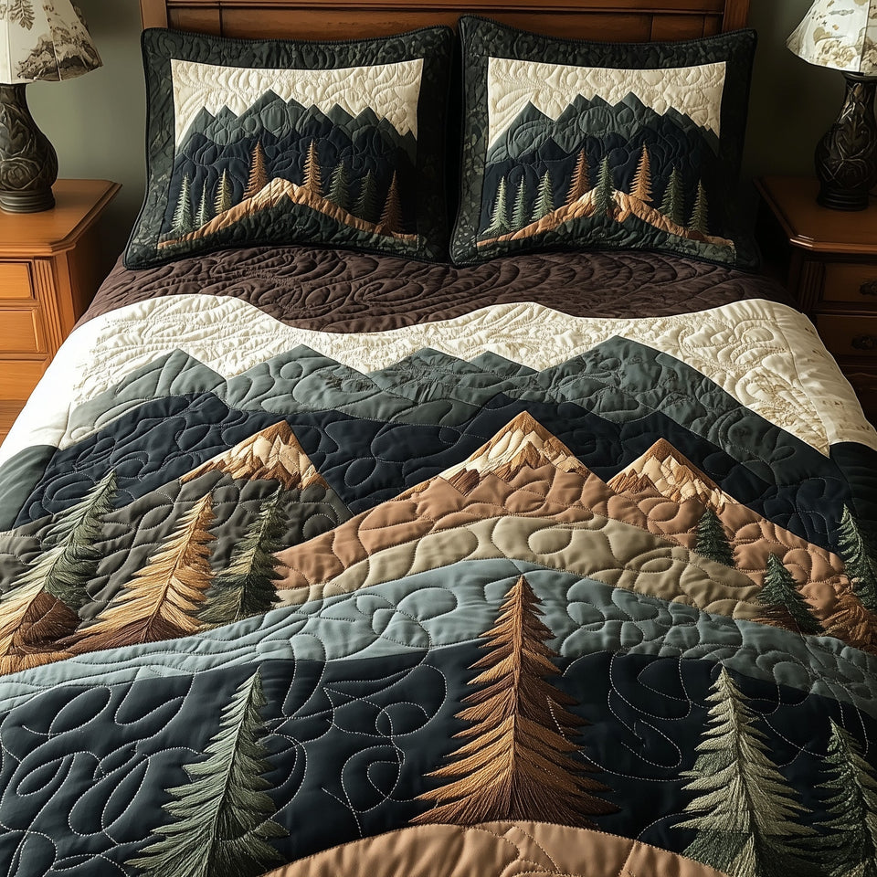 Mountain Embrace Earth Peaks quilted bedding set, quilt and two pillow shams on a made bed