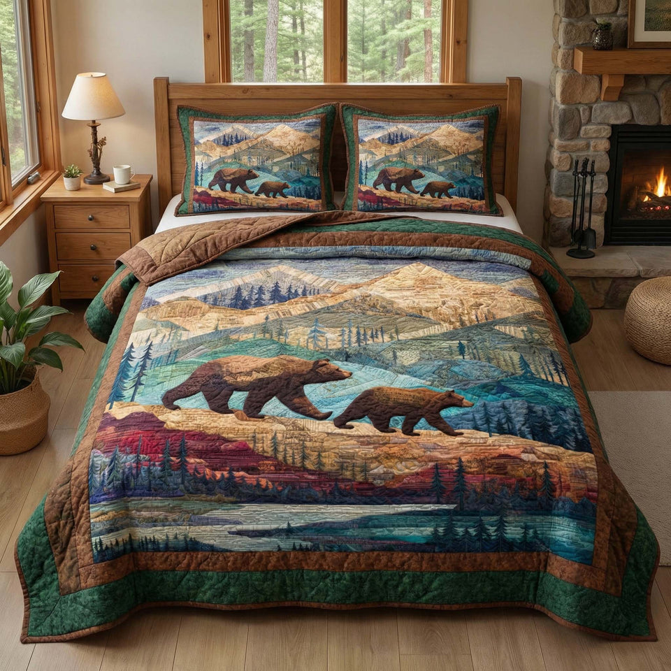 Mountain Trek quilted bedding set, quilt and two pillow shams on a made bed