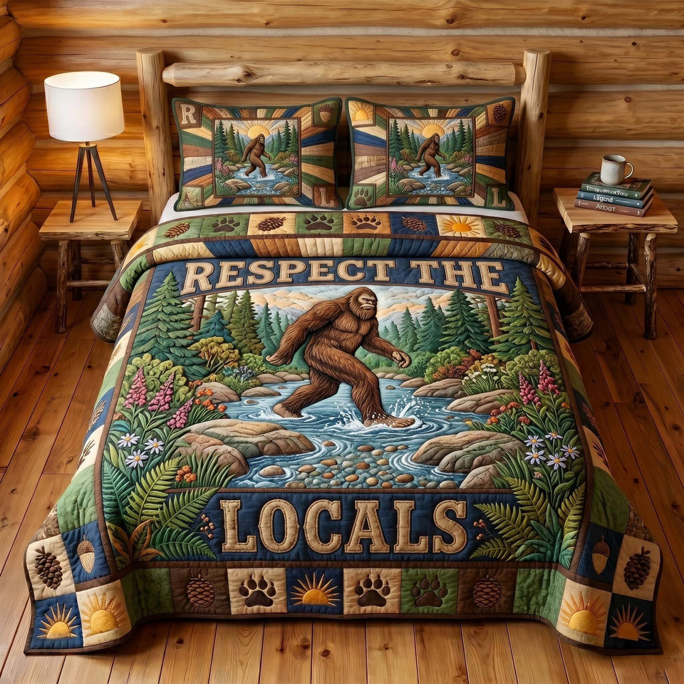 Mystic Sasquatch Crossing the Stream quilted bedding set, quilt and two pillow shams on a made bed
