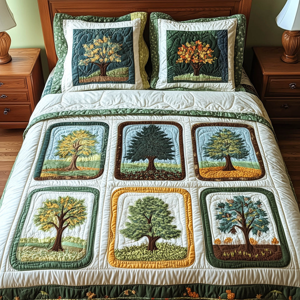 Nature Charm Six Trees in Gold Frames quilted bedding set, quilt and two pillow shams on a made bed
