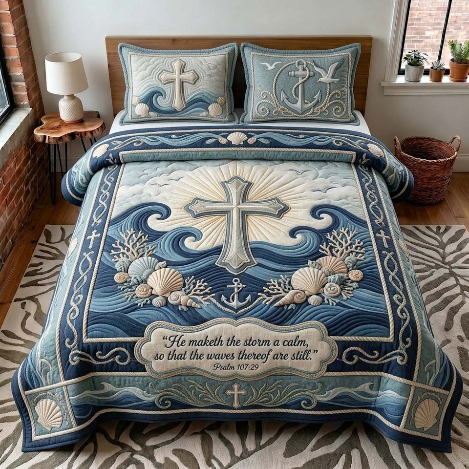 Ocean Cross quilted bedding set, quilt and two pillow shams on a made bed
