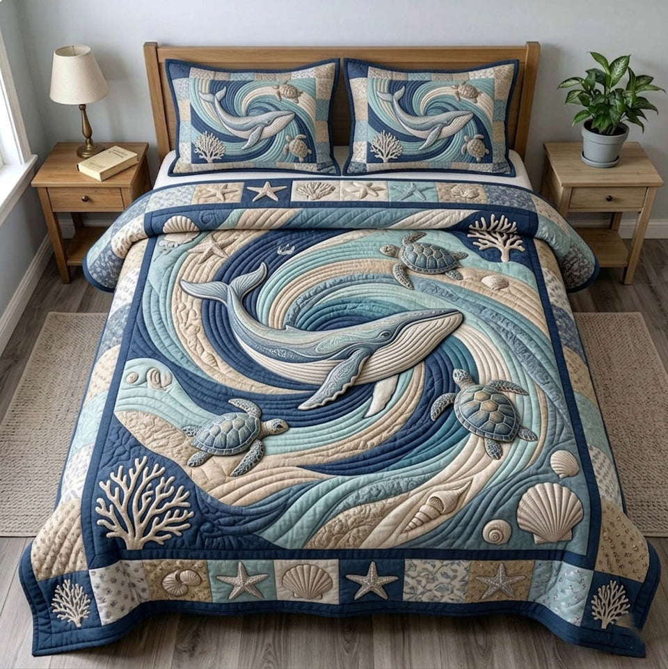 Ocean Wave Pale Whale Swirl quilted bedding set, quilt and two pillow shams on a made bed