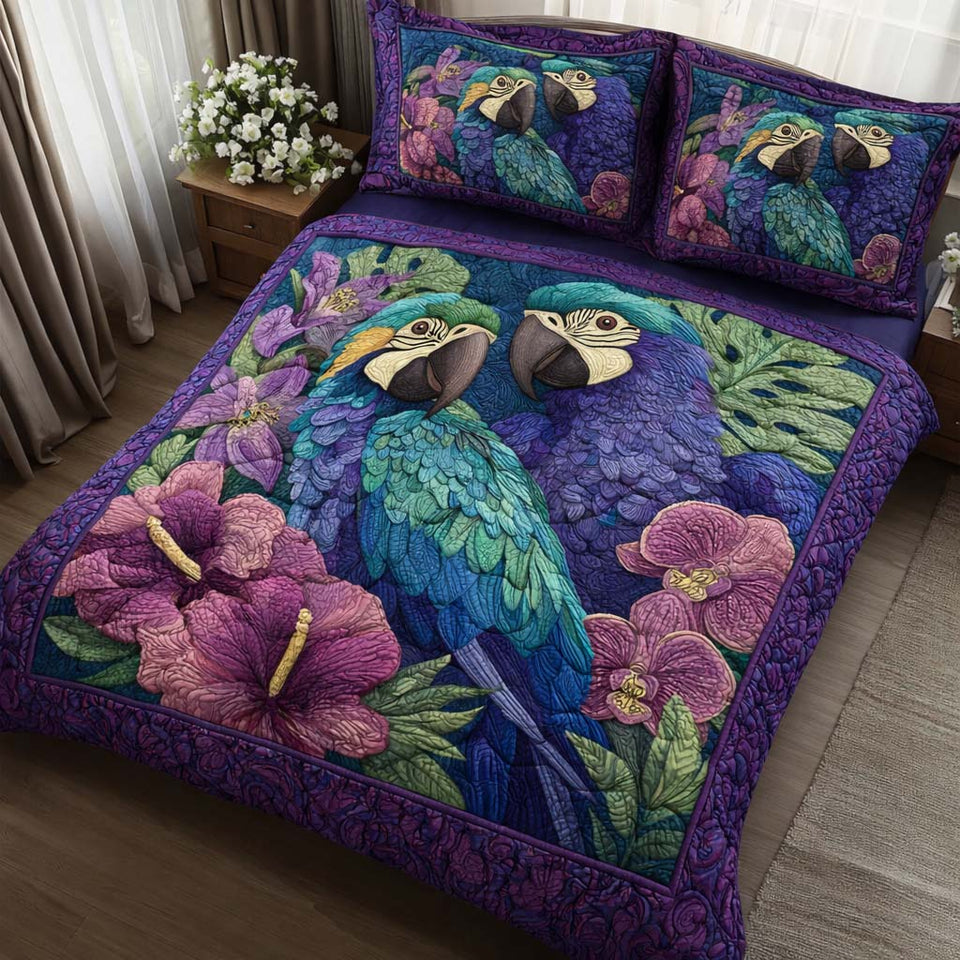 Orchid Parrots quilted bedding set, quilt and two pillow shams on a made bed