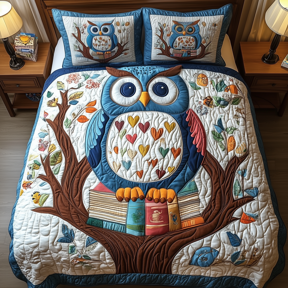 Owl Scholar Heart Tree quilted bedding set, quilt and two pillow shams on a made bed
