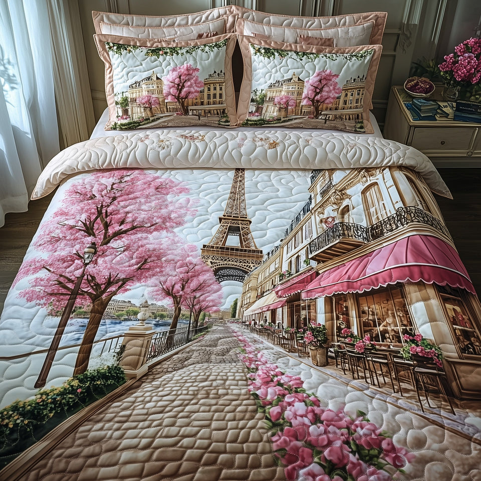 Paris in Bloom quilted bedding set, quilt and two pillow shams on a made bed