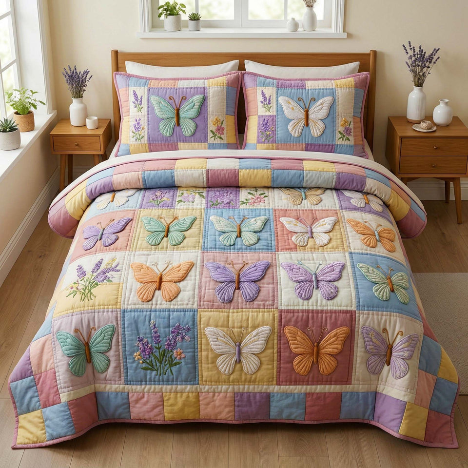 Pastel Patchwork quilted bedding set, quilt and two pillow shams on a made bed
