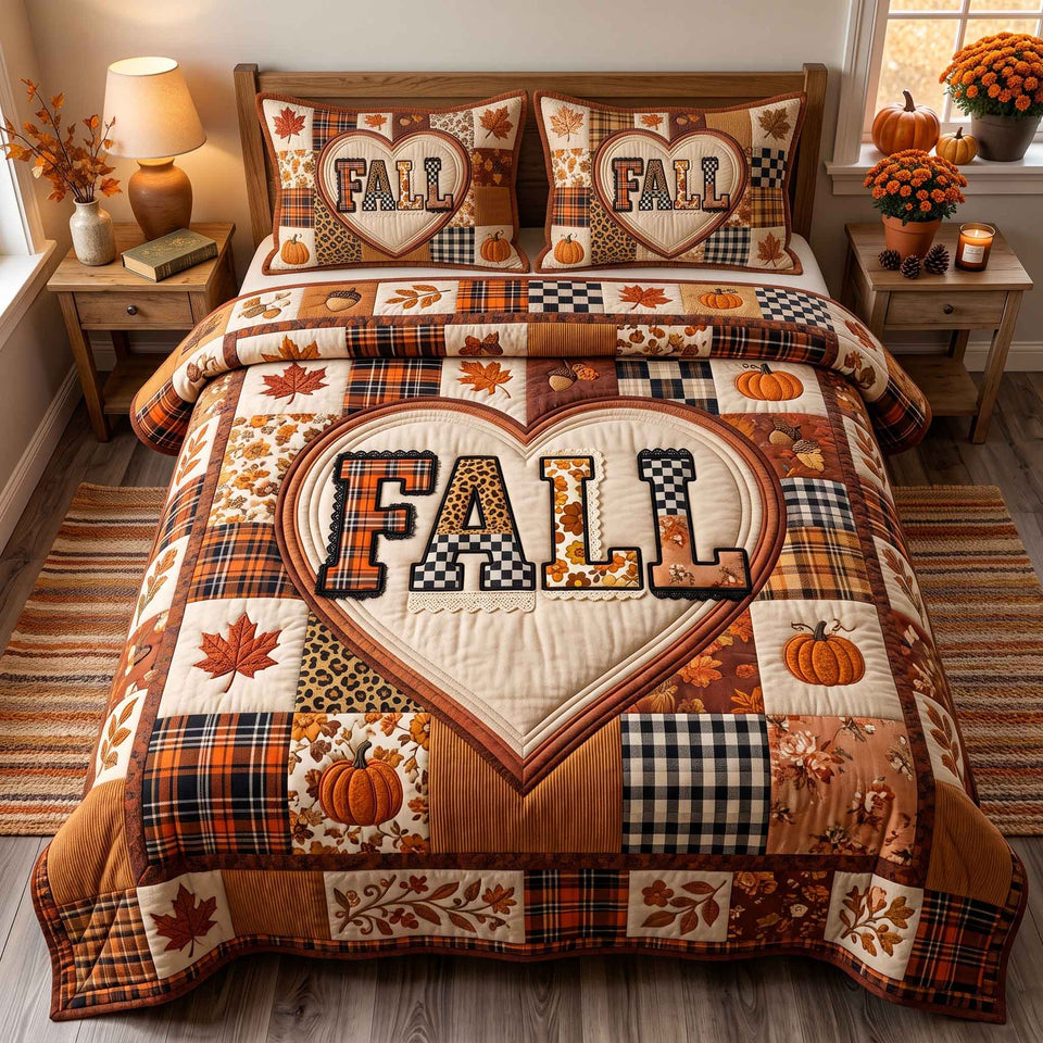 Patchwork Autumn Bliss Fall quilted bedding set, quilt and two pillow shams on a made bed