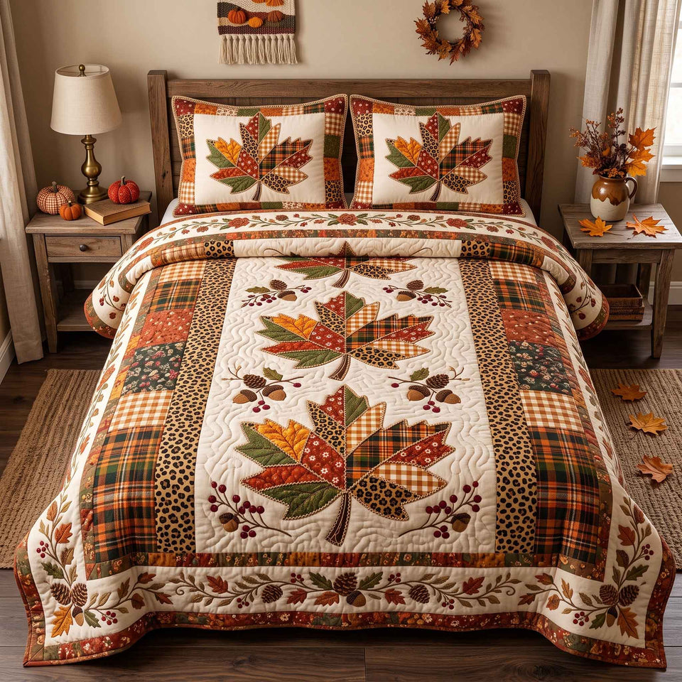 Patchwork Autumn Bliss quilted bedding set, quilt and two pillow shams on a made bed