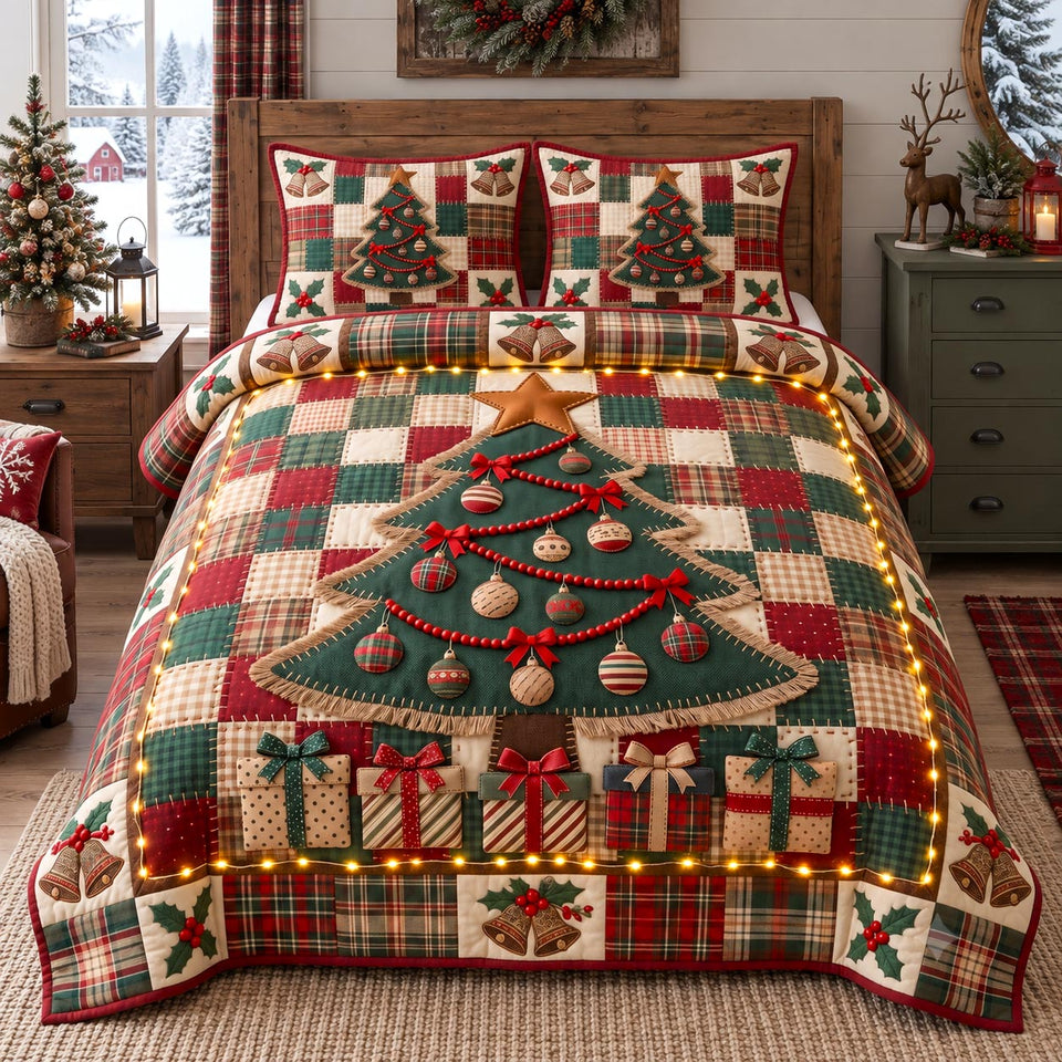 Patchwork Christmas Tree Evergreen quilted bedding set, quilt and two pillow shams on a made bed