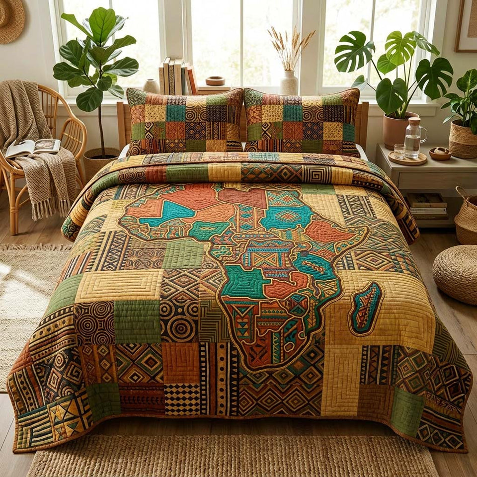 Patchwork Map quilted bedding set, quilt and two pillow shams on a made bed