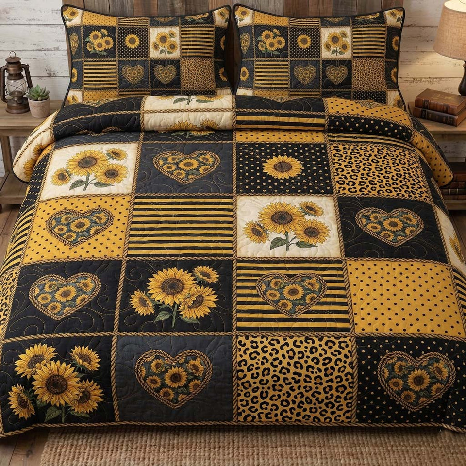 Patchy Sunflower quilted bedding set, quilt and two pillow shams on a made bed