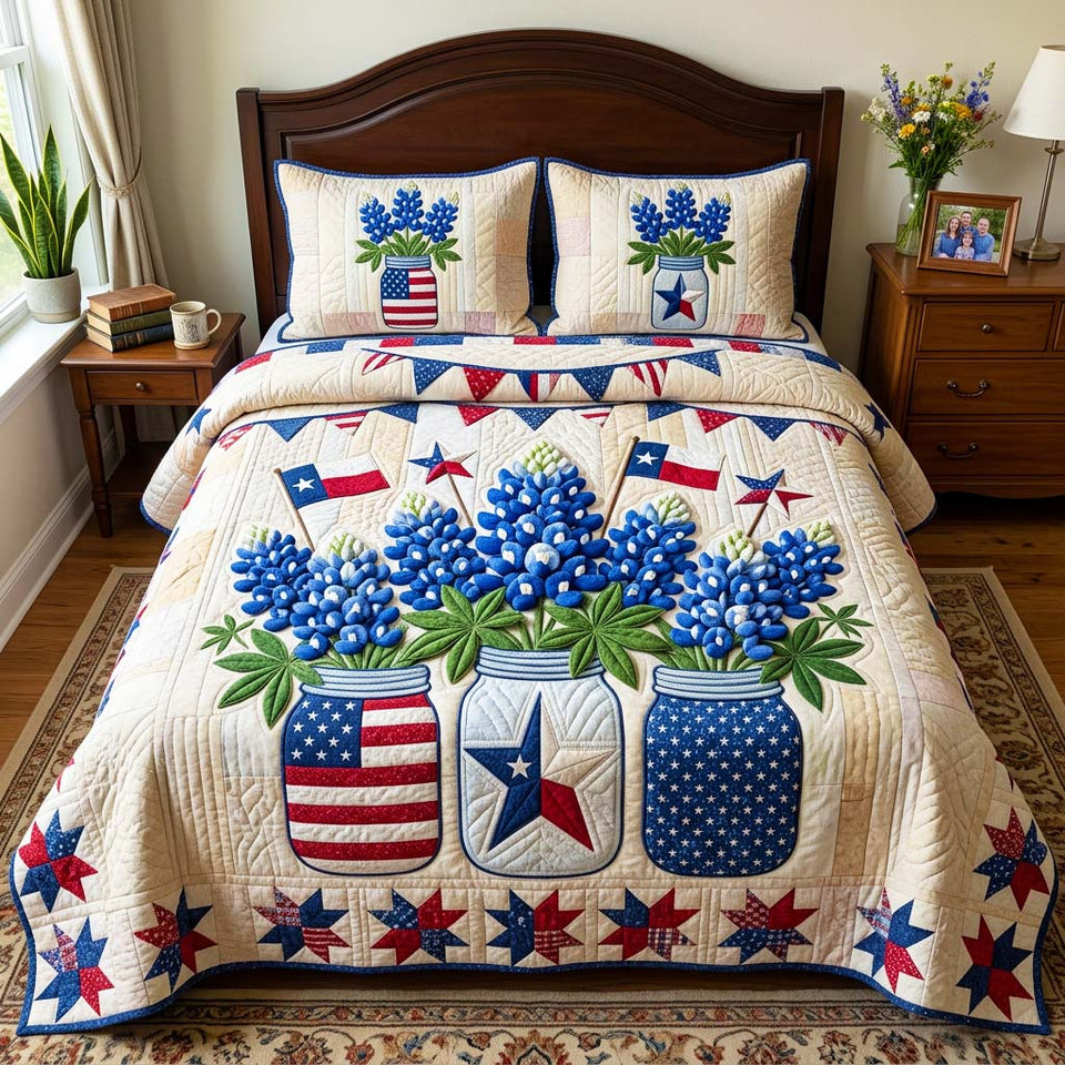 Patriotic Bluebonnet quilted bedding set, quilt and two pillow shams on a made bed