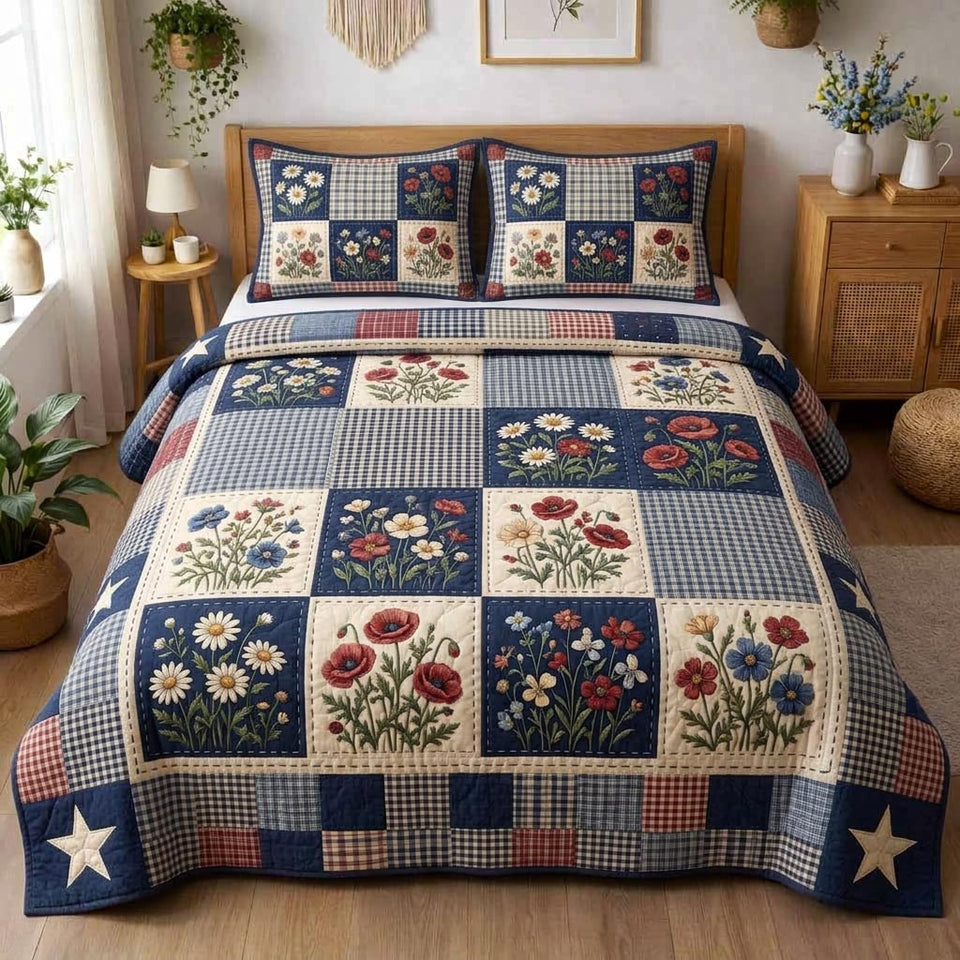 Patriotic Wildflower quilted bedding set, quilt and two pillow shams on a made bed