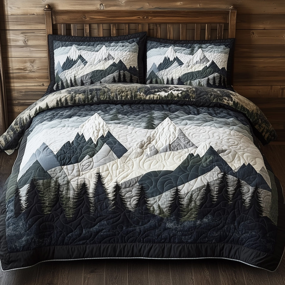 Peaceful Mountain Forest Snow Peak Grey quilted bedding set, quilt and two pillow shams on a made bed