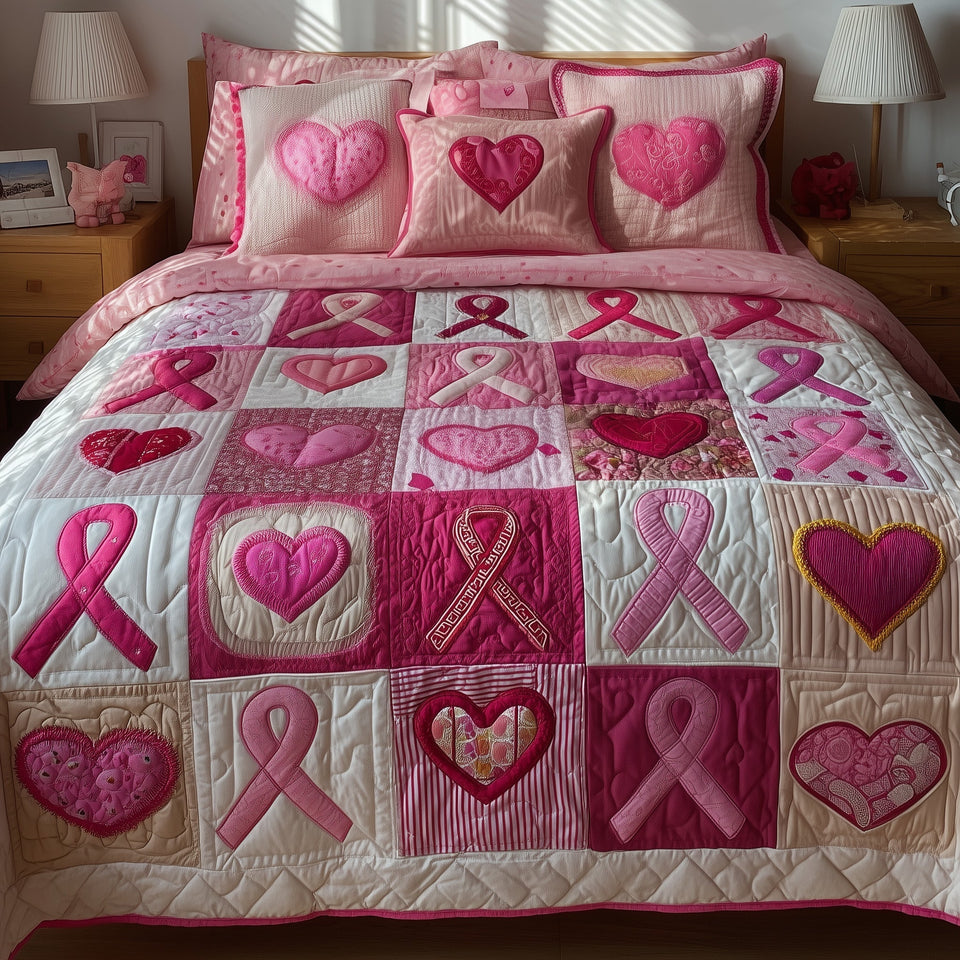 Pink Ribbon Hearts Courage quilted bedding set, quilt and two pillow shams on a made bed