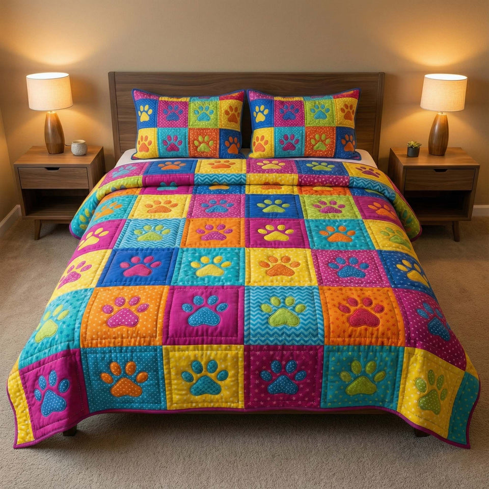 Playful Paws Rainbow Blocks quilted bedding set, quilt and two pillow shams on a made bed