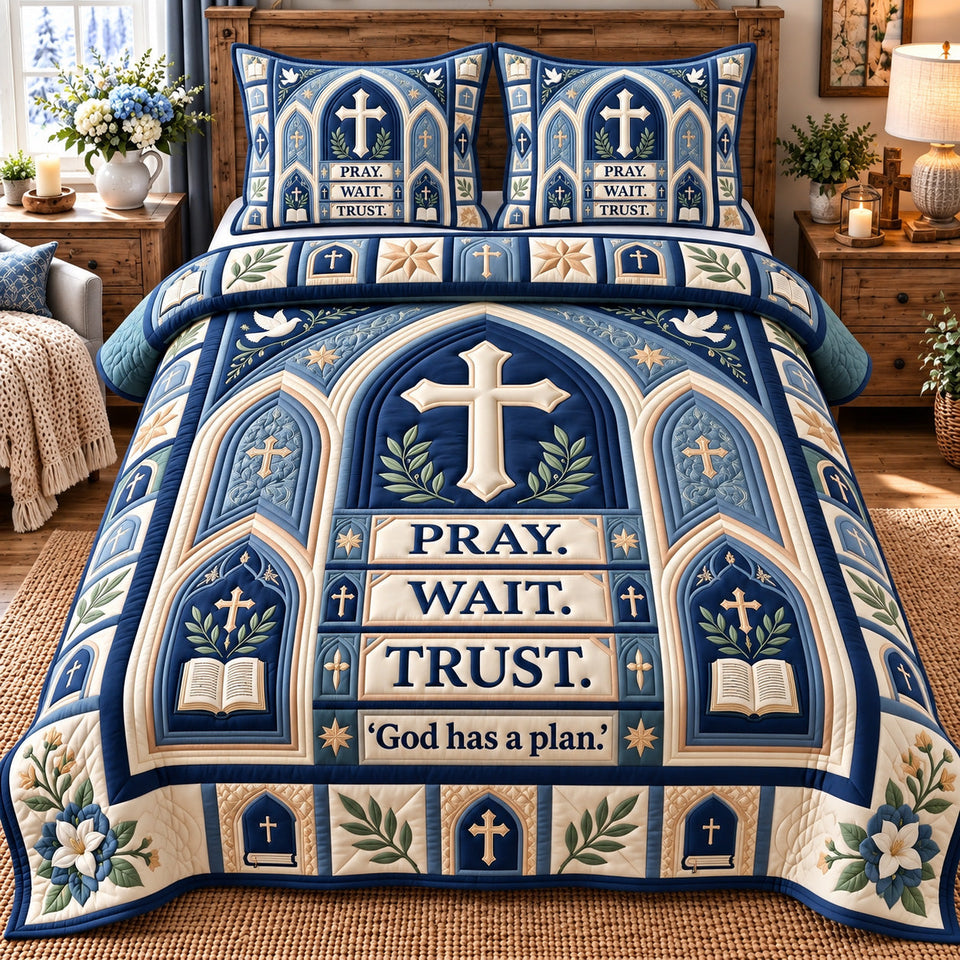 Pray Wait Trust God quilted bedding set, quilt and two pillow shams on a made bed