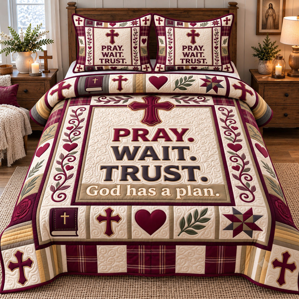 Pray Wait Trust in Cream quilted bedding set, quilt and two pillow shams on a made bed