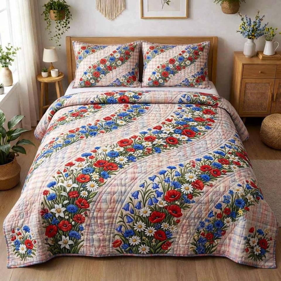 Proud Bloom quilted bedding set, quilt and two pillow shams on a made bed