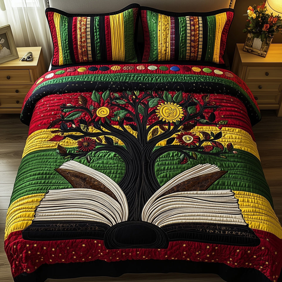 Proud Roots Book and Tree of Knowledge quilted bedding set, quilt and two pillow shams on a made bed