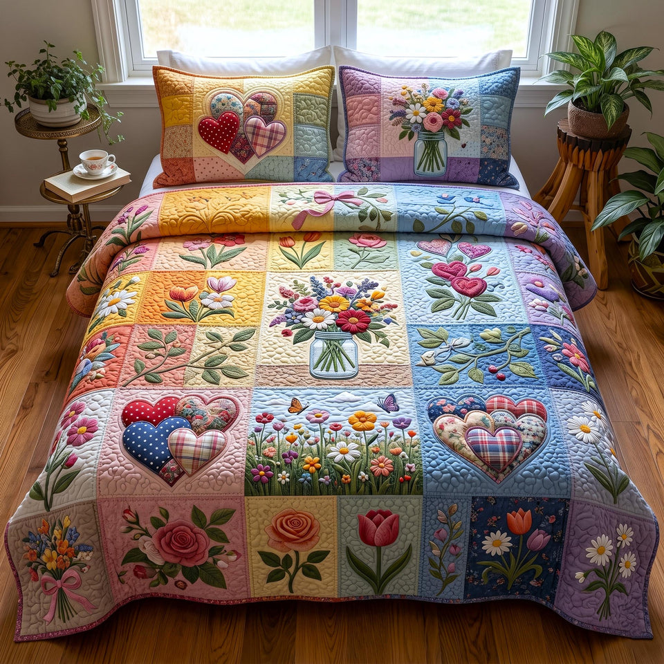 Proud to Love quilted bedding set, quilt and two pillow shams on a made bed