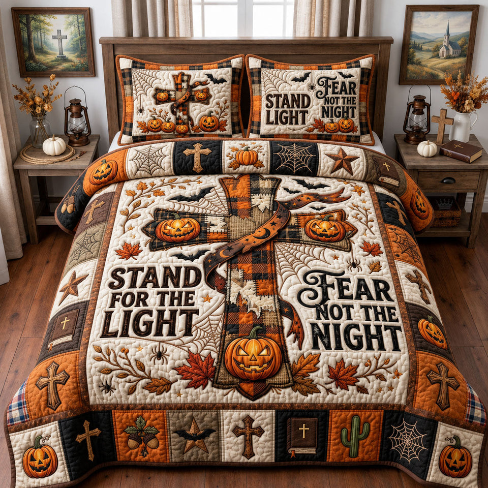 Pumpkin Cross Faith quilted bedding set, quilt and two pillow shams on a made bed