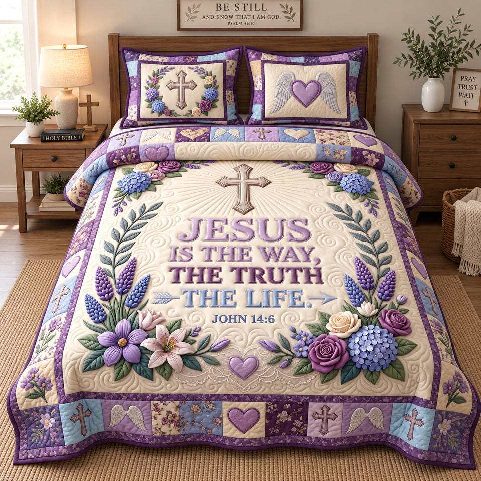 Purple Floral Grace quilted bedding set, quilt and two pillow shams on a made bed