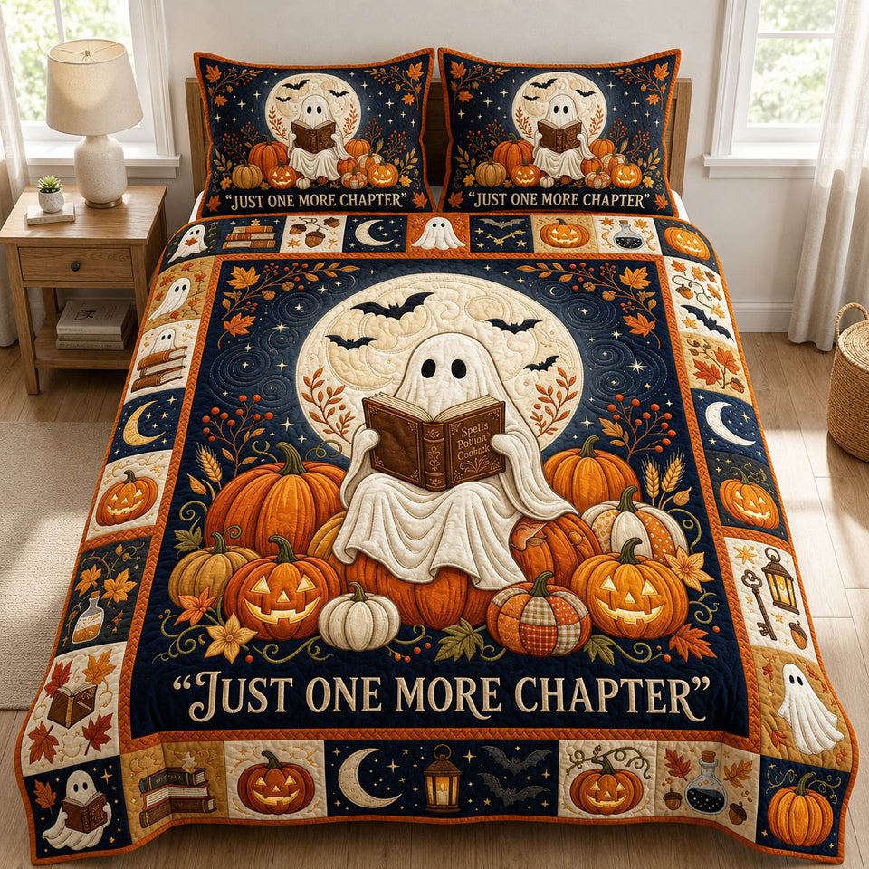 Reading Ghost quilted bedding set, quilt and two pillow shams on a made bed