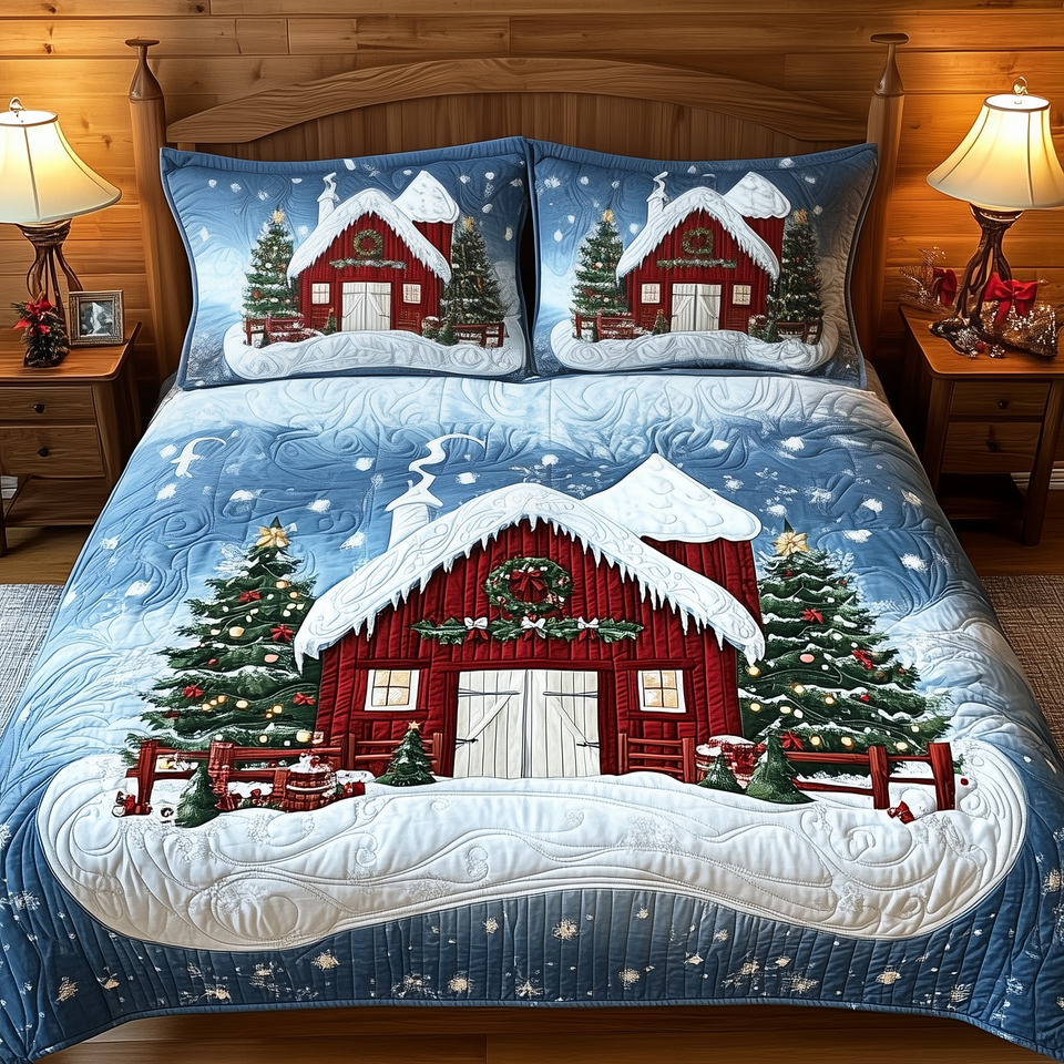 Red Barn Snowfall Christmas quilted bedding set, quilt and two pillow shams on a made bed