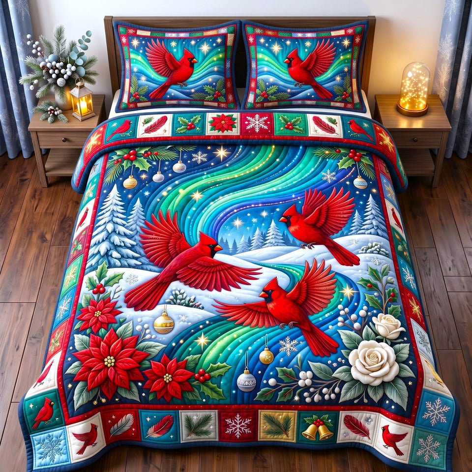 Red Cardinal Christian Faith quilted bedding set, quilt and two pillow shams on a made bed