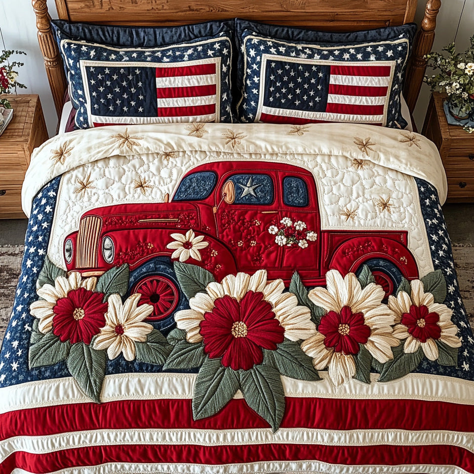 Red Truck USA quilted bedding set, quilt and two pillow shams on a made bed